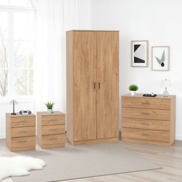 100-108-096_1 - Jamies Furniture Light oak bedroom set with a tall wardrobe, two matching nightstands, and a five-drawer dresser in a bright room.