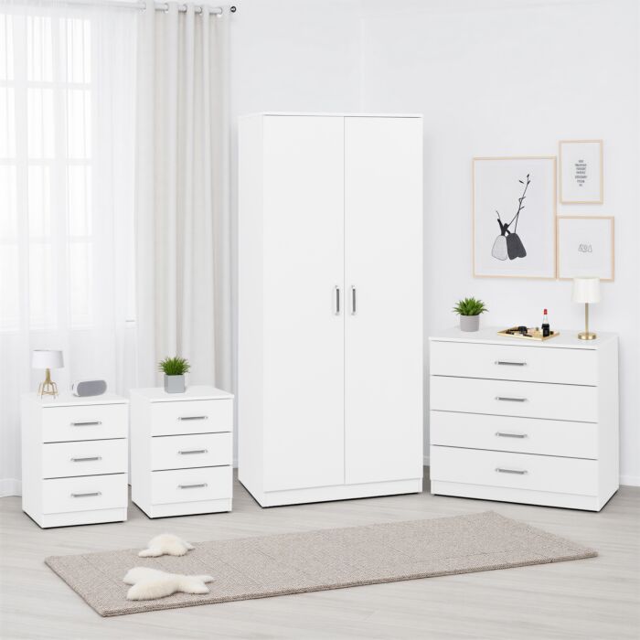 100-108-099 - Jamies Furniture Minimalist white bedroom furniture set: wardrobe, two nightstands, a chest of drawers, with plants and wall art in a bright room.