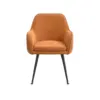 Orange upholstered armchair with a curved back and black metal legs.